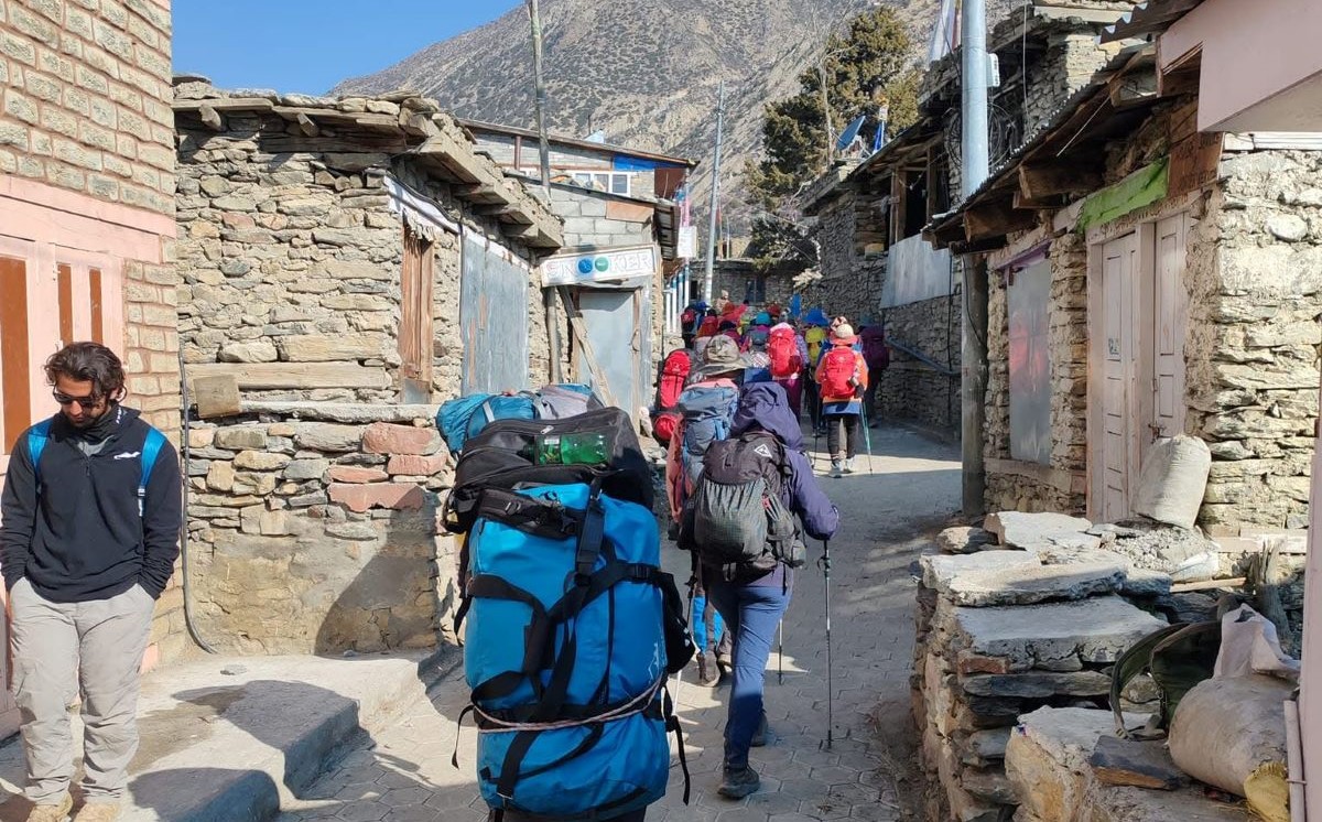 Porter are Carrying Heavy Bagpacks