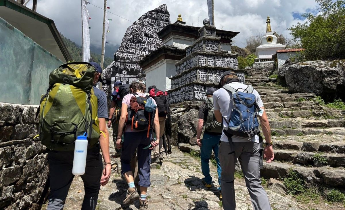 Travelers are on the way to Namche Bazar During Everest 3 Passes Trek