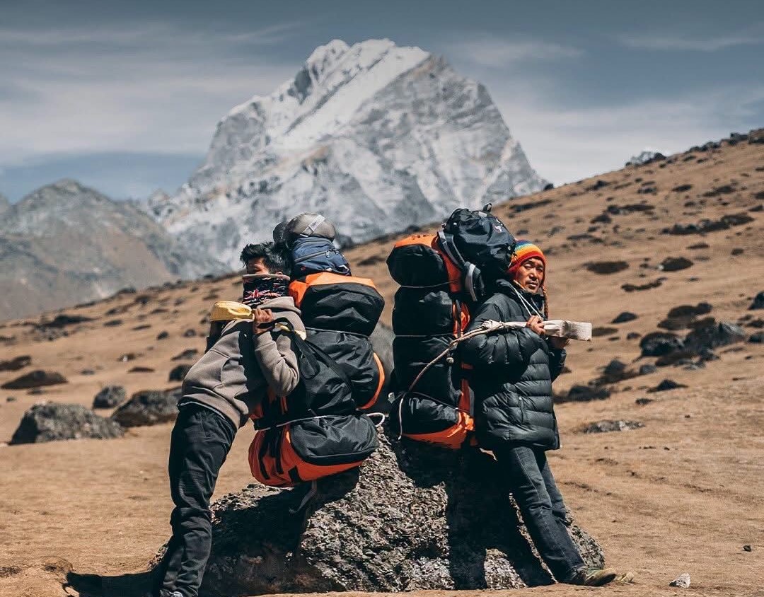 Porters are carrying heavy Bagpacks during Everest Expedition